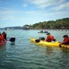 tourists-on-their-kayaks-with-the-trainer_550x.progressive